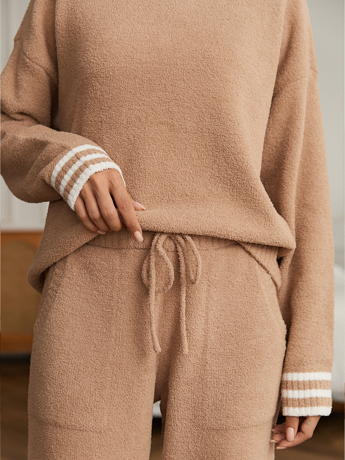 Close up of women long sleeve crewneck knit loungewear set in Khaki, showcasing drawstring waist and soft knit texture #color_Khaki