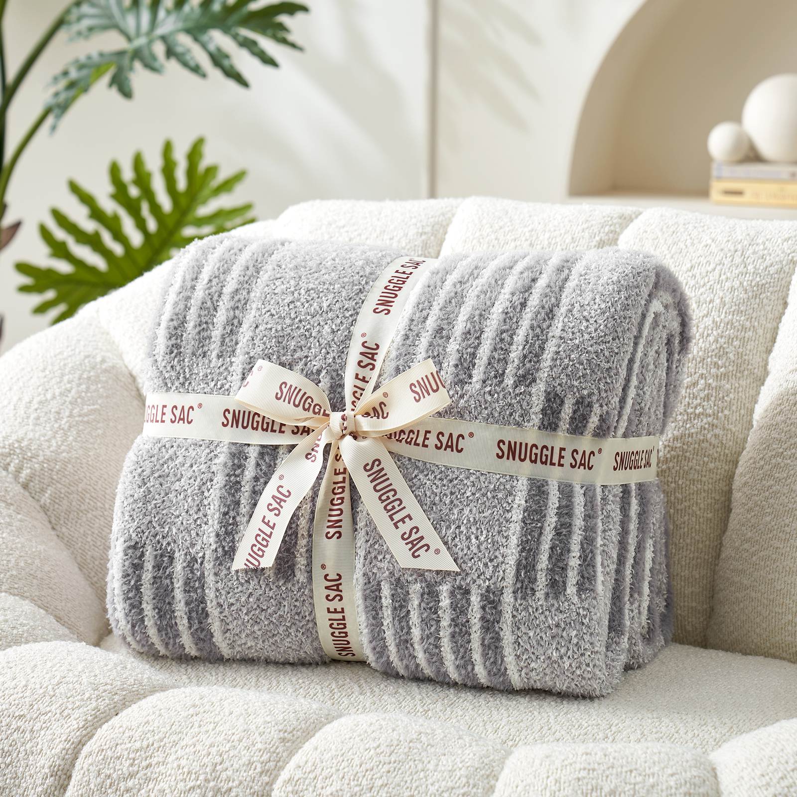 Snuggle Sacs Reversible Heather Checkered Feather Yarn Knit Throw Blanket wrapped as a pefect gift with ribbon#Color_Heather Grey