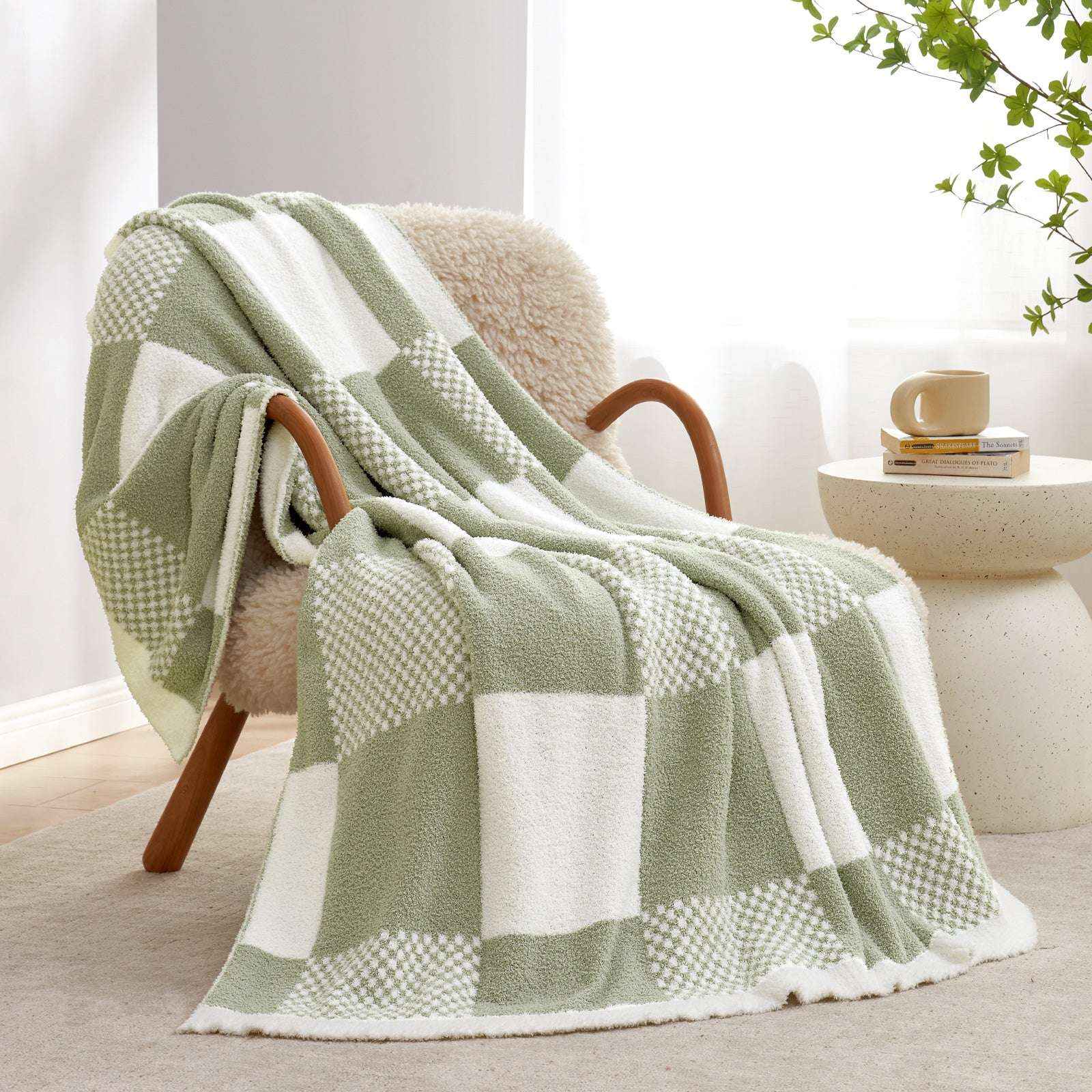 Snuggle Sac Checkered Feather Yarn Knit Throw Blanket on the chair with furnitures behind#Color_Sage Green