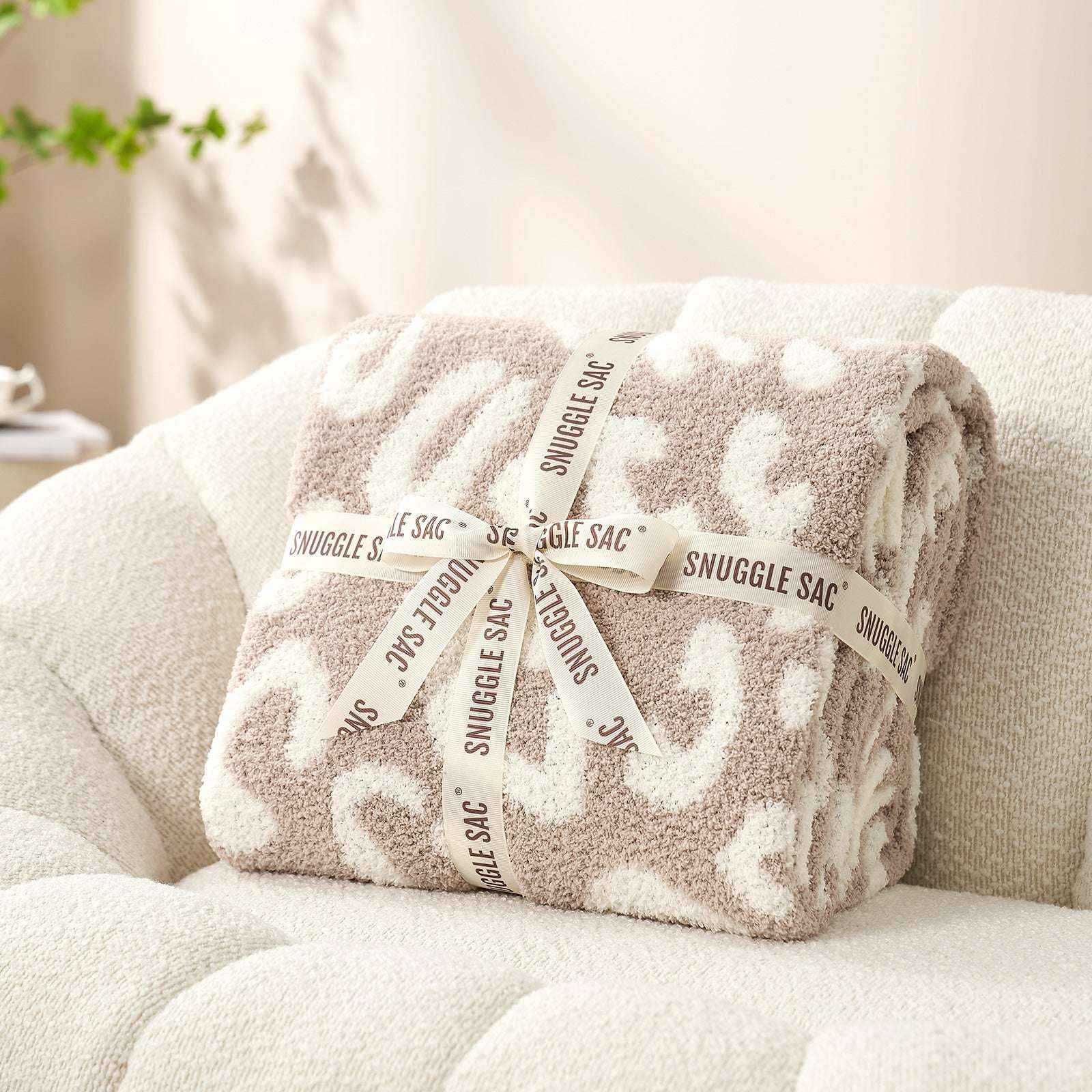 Reversible Leopard Feather Yarn Knit Throw Blanket wrapped as a perfect gift with ribbon #Color_Leopard Beige