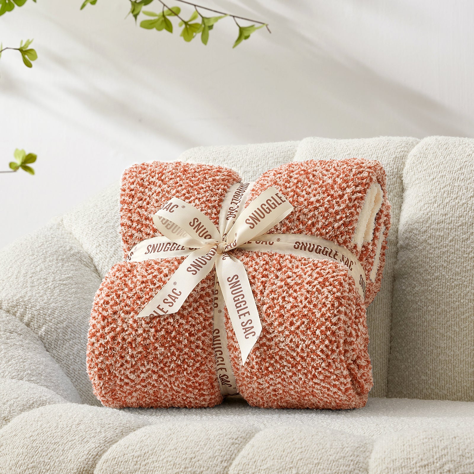 Snuggle Sac Heather Feather Yarn Orange Knit Throw Blanket wrapped as a perfect gift for people#Color_Orange