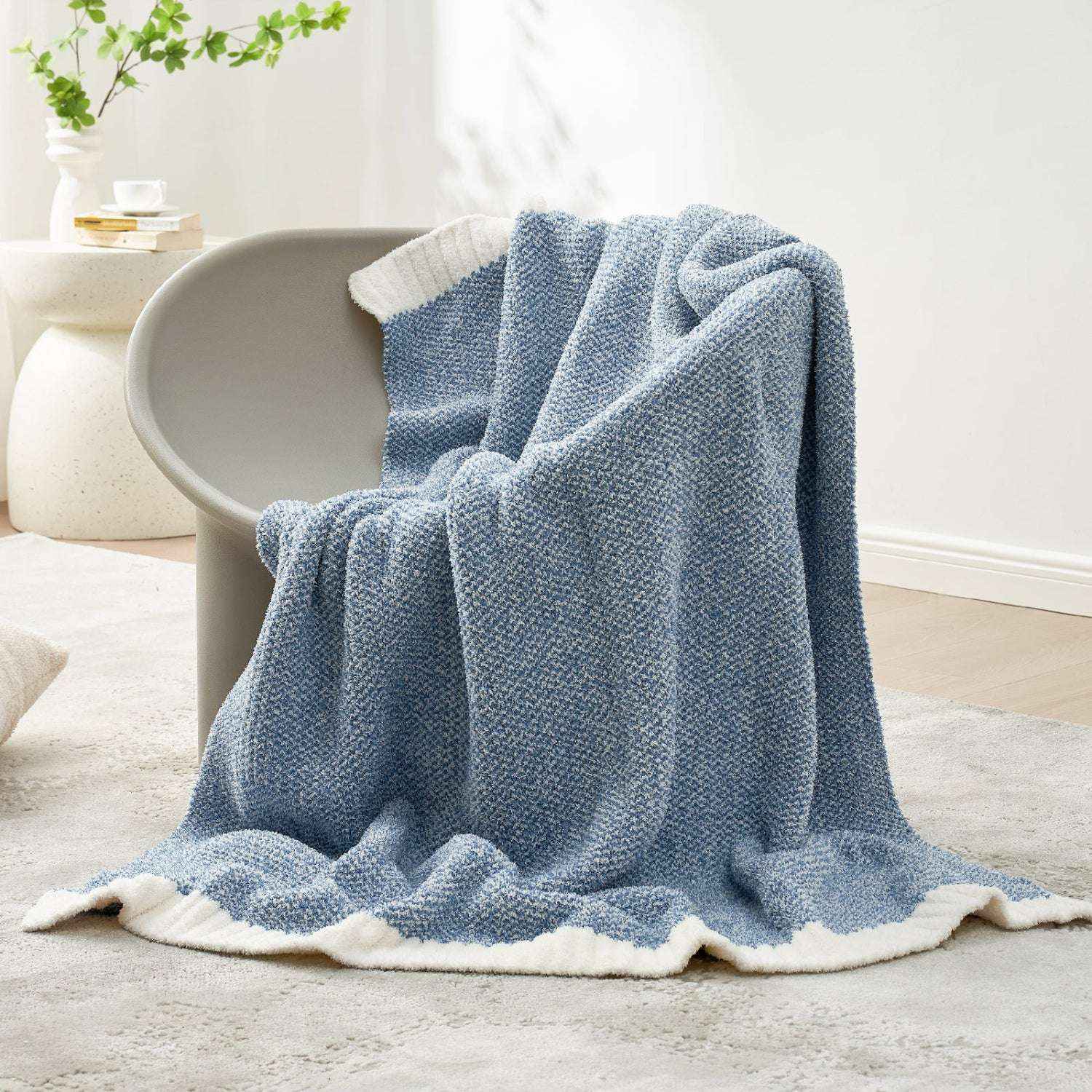 Snuggle Sac Heather Feather Yarn Pale Blue  Knit Throw Blanket on the chair#Color_Pale Blue