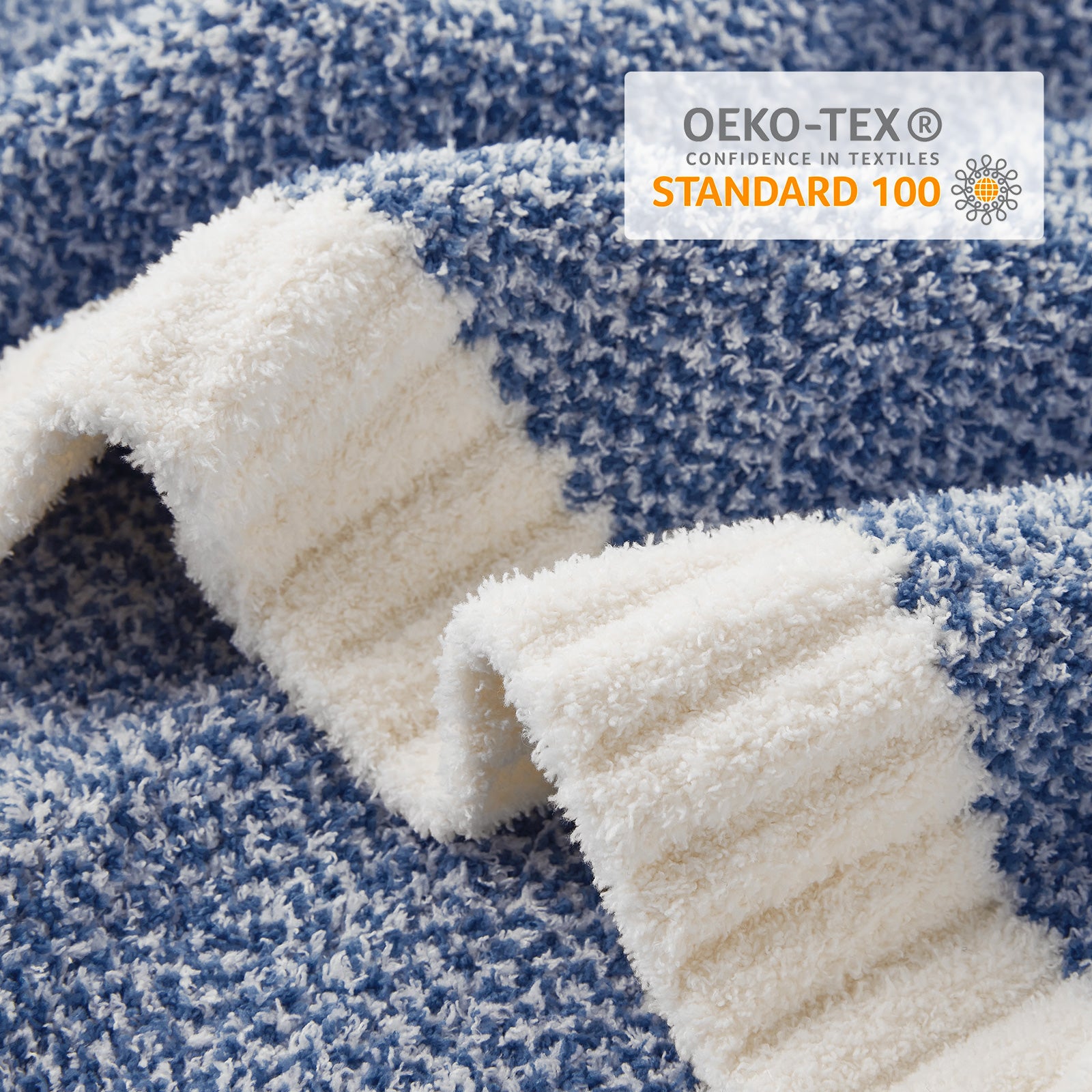 Close up of Snuggle Sac Heather Feather Yarn Knit Throw Blanket with OEKO-TEX Certificate#color_Heather Royal Blue