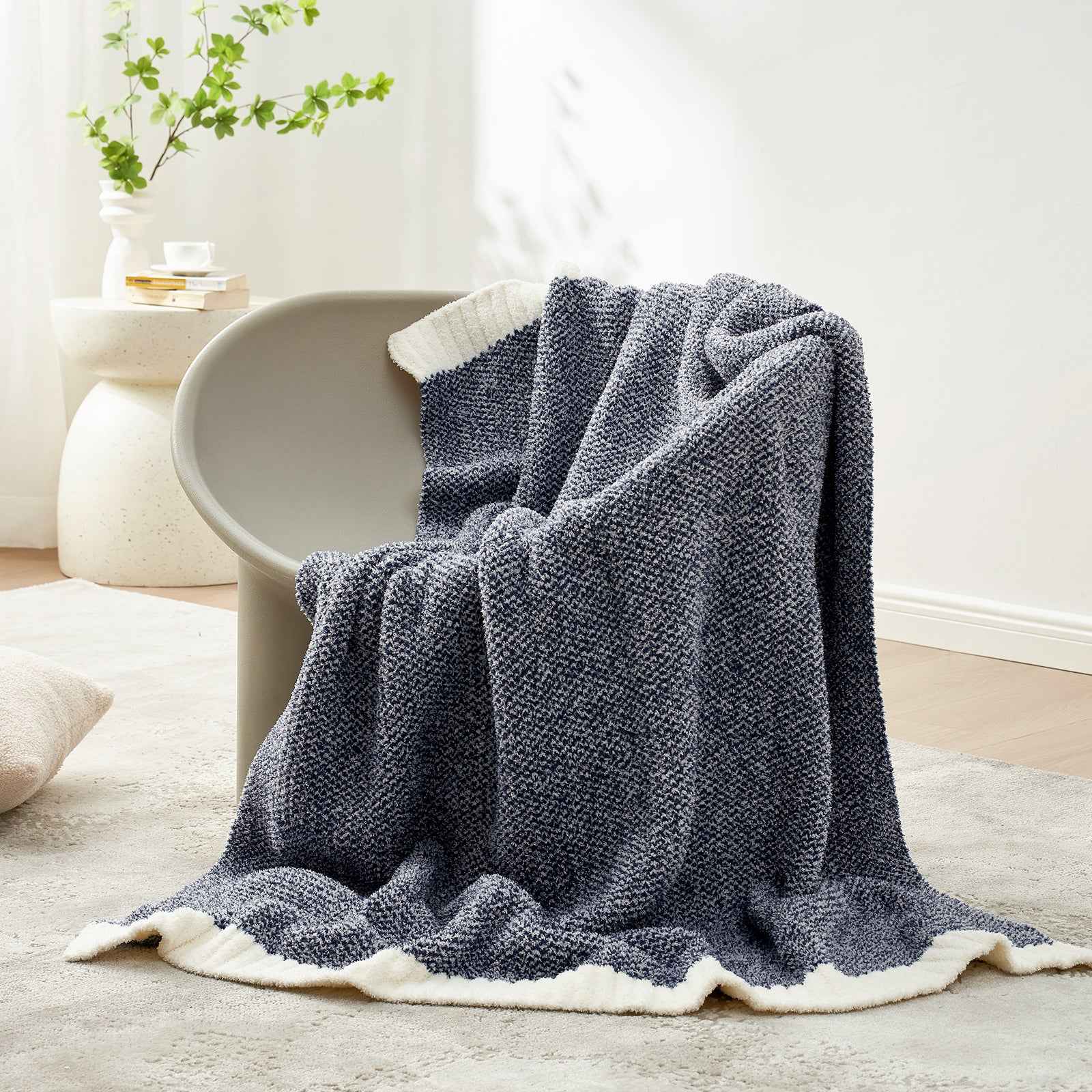 Snuggle Sac Heather Feather Yarn dark blue Knit Throw Blanket on the chair#Color_Dark Blue