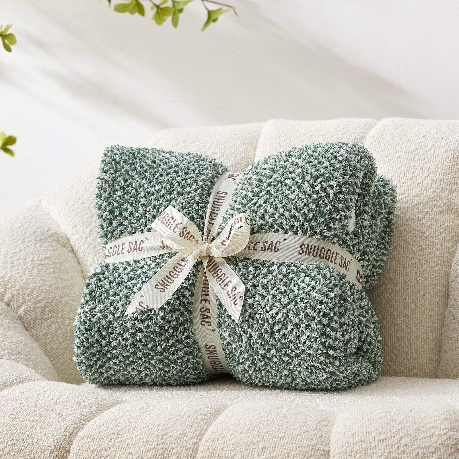Snuggle Sac Heather Feather Yarn Heather green Knit Throw Blanket wrapped as a perfect gift for people#Color_Heather Green