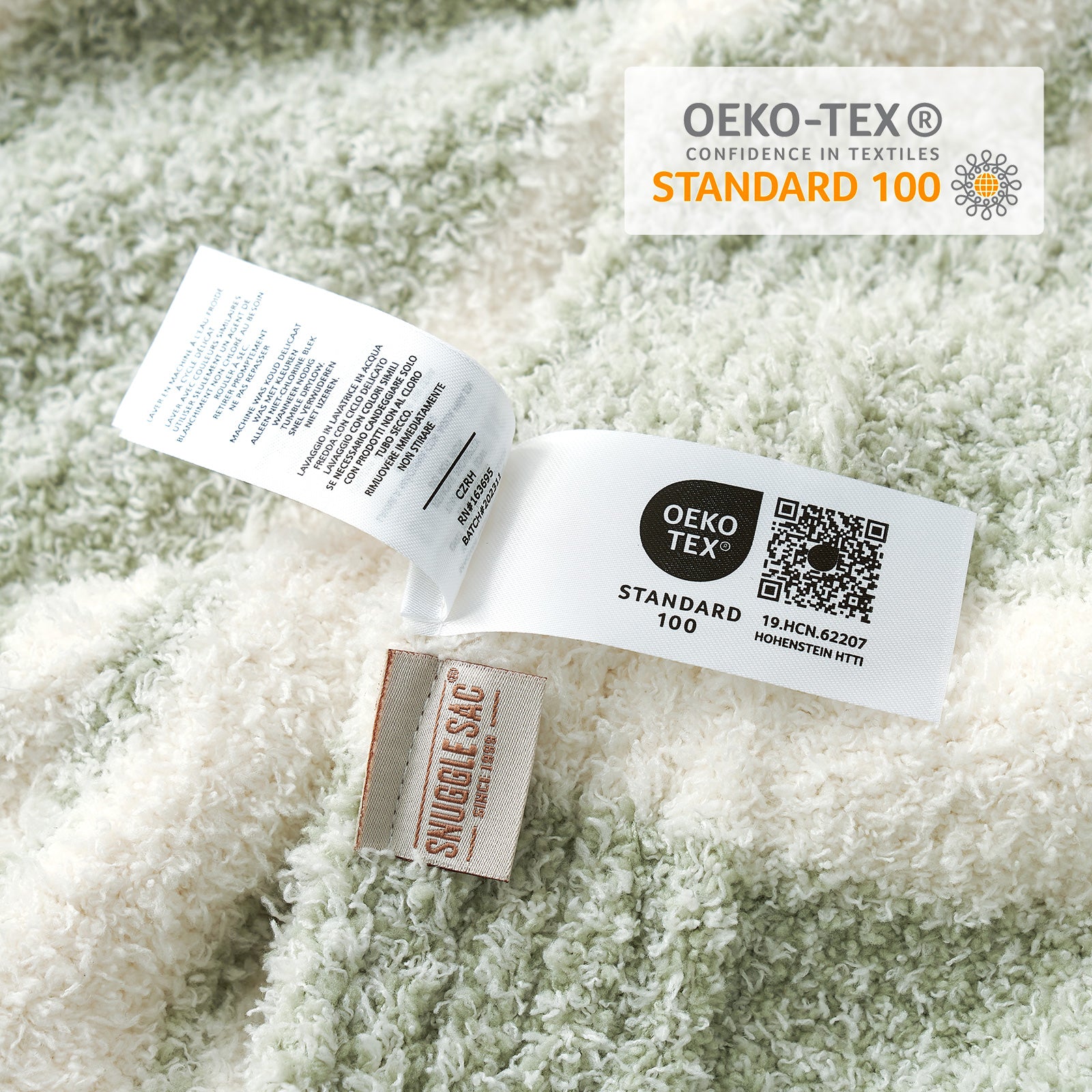 Close up of Striped Feather Yarn Knit Throw Blanket showing OEKO-TEX Certificate#Color_Sage Green