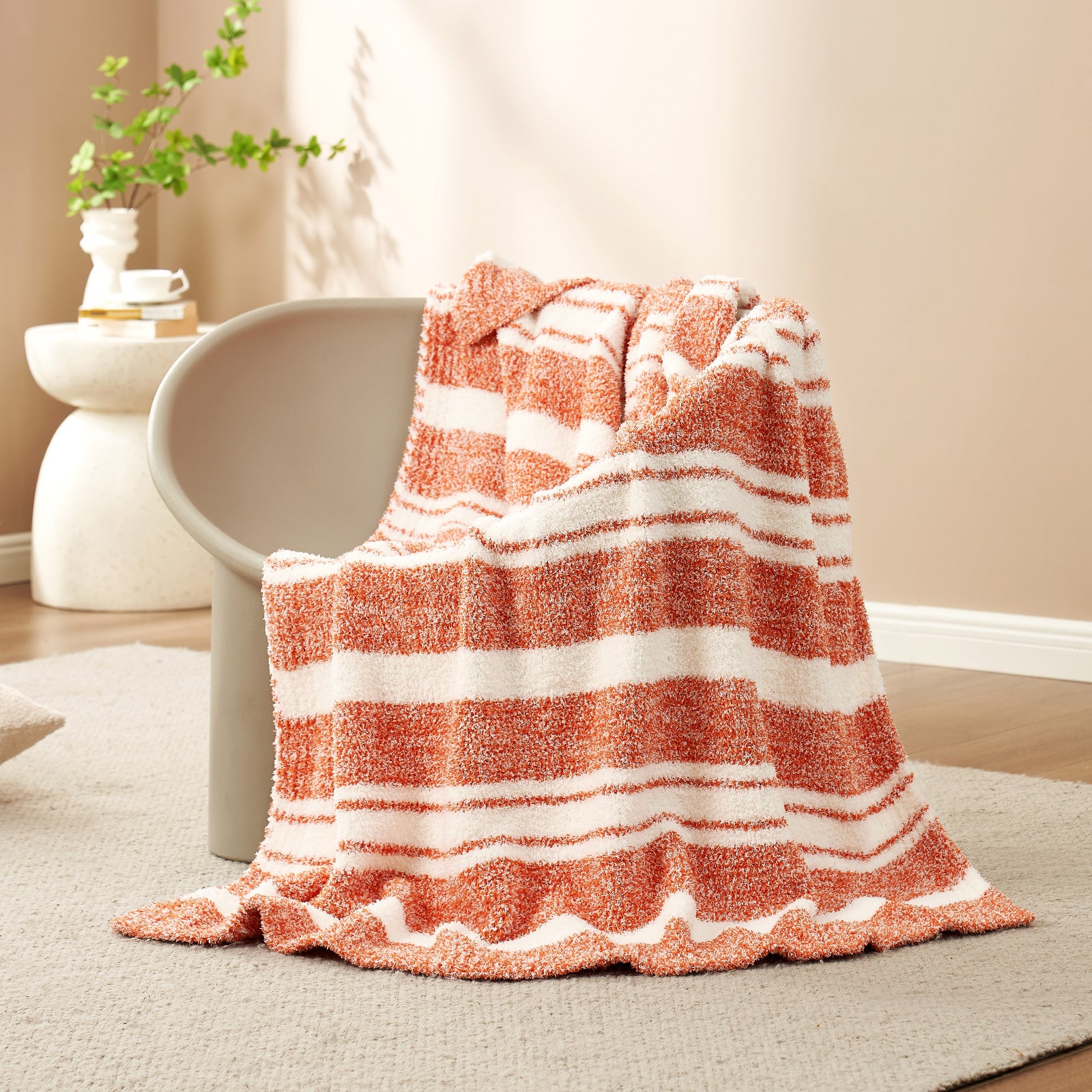 Striped Feather Yarn Knit Throw Blanket on a brown chair#Color_Orange